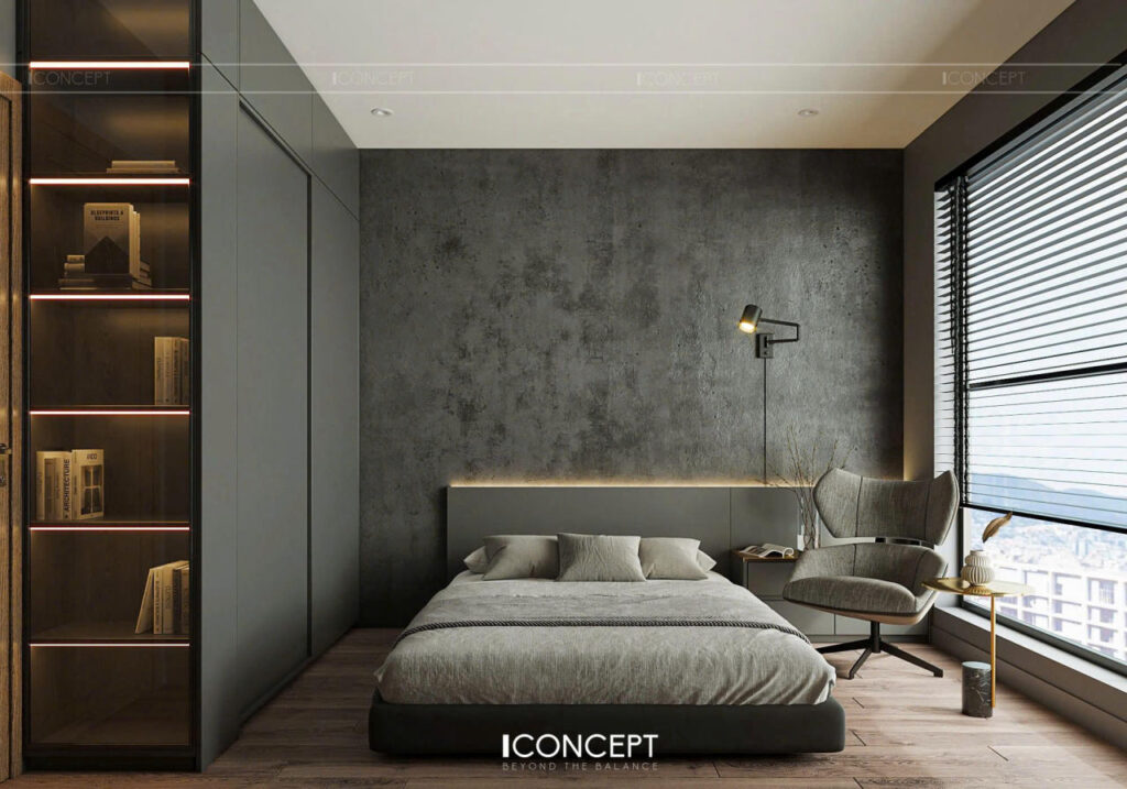 Phòng ngủ được bao phủ bởi các lớp màu xám – từ xám nhạt của tường, xám ghi của ga giường, đến xám đậm của tủ gỗ và đầu giường – tất cả tạo nên một bản phối màu đầy chiều sâu, tinh tế và thư giãn.