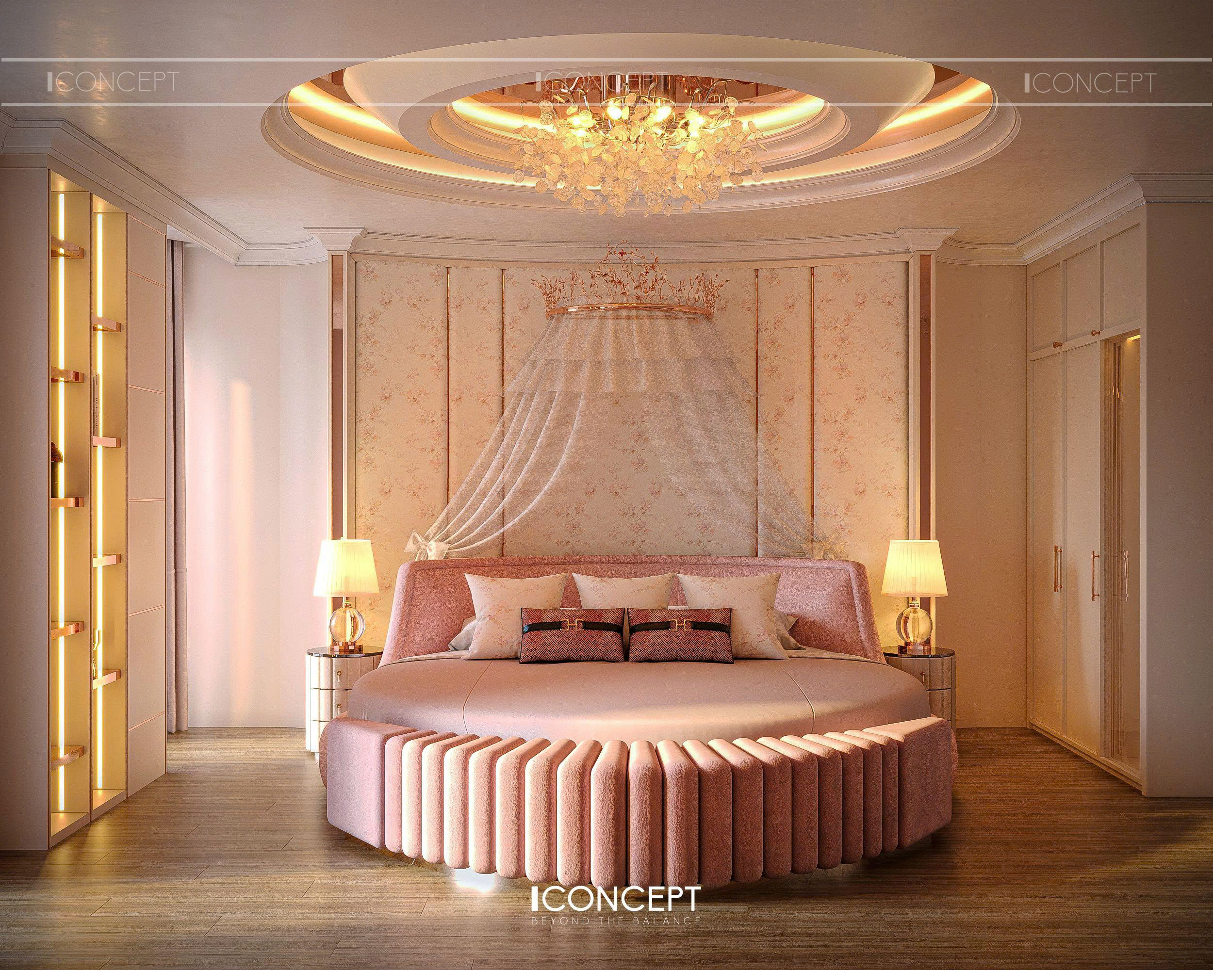 Chiếc giường tròn bọc nệm cao cấp trở thành tâm điểm, mang lại cảm giác mềm mại và khác biệt so với những thiết kế giường truyền thống. Phần tựa lưng và ghế cong ở chân giường tạo đường nét uyển chuyển, đồng điệu với tổng thể.